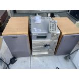A SONY HI-FI SYSTEM WITH TWO SPEAKERS BELIEVED IN WORKING ORDER BUT NO WARRANTY