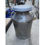 A MEDIUM SIZED 'NESTLE' MILK CHURN WITH LID