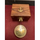 A SMALL BOXED BRASS BOY SCOUT COMPASS