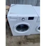 A WHITE BEKO 9KG WASHING MACHINE BELIEVED IN WORKING ORDER BUT NO WARRANTY