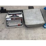 A BROTHER DELUXE TYPE WRITER WITH CASE