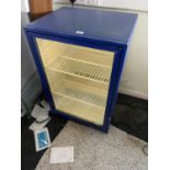 A GLASS FRONTED BOTTLE FRIDGE, BELIEVED IN WORKING ORDER BUT NO WARRANTY THIS ITEMS TO BE