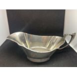 A HALLMARKED SILVER GRAVY BOAT BIRMINGHAM 1947, WITH WEIGHTED BASE GROSS WEIGHT APPROXIMATELY 166