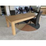 A LARGE DINING TABLE AND THREE LEATHER EFFECT DINING CHAIRS THIS ITEMS TO BE COLLECTED FROM THE