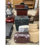A CORBY TROUSER PRESS, A HEATER AND TWO SUITCASES
