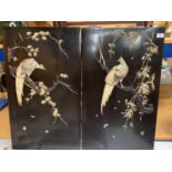 A PAIR OF CHINESE EBONISED WALL PLAQUES DEPICTING MOTHER OF PEARL BIRDS WITH ARTIST'S SIGNED STAMP