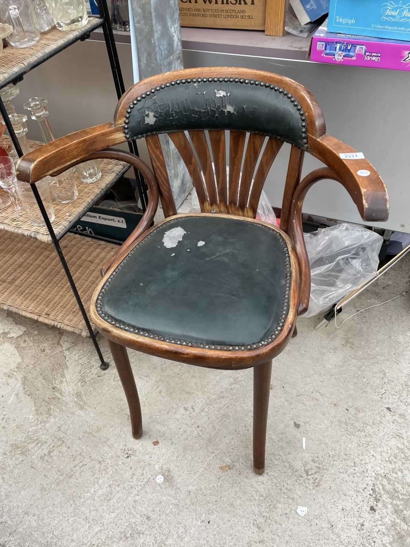 A BENTWOOD ELBOW CHAIR