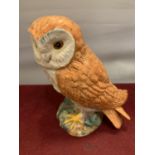 A MEDIUM SIZED BESWICK OWL