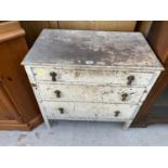 A WHITE PAINTED THREE DRAWER CHEST