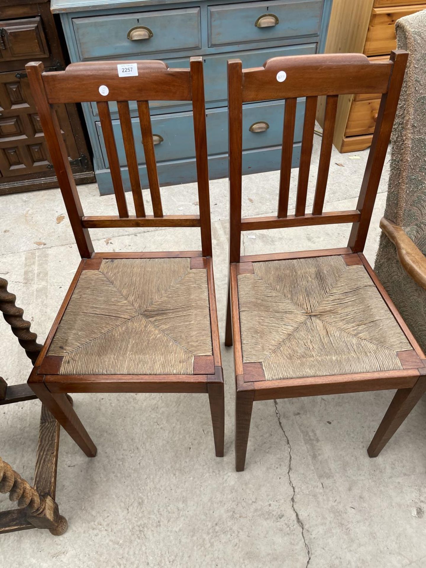 A PAIR OF MAHOGANY RUSH SEATED BEDROOM CHAIRS