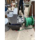 AN ASSORTMENT OF ITEMS TO INCLUDE A HOSE PIPE, REELS OF WIRE AND EXTENSION LEADS ETC