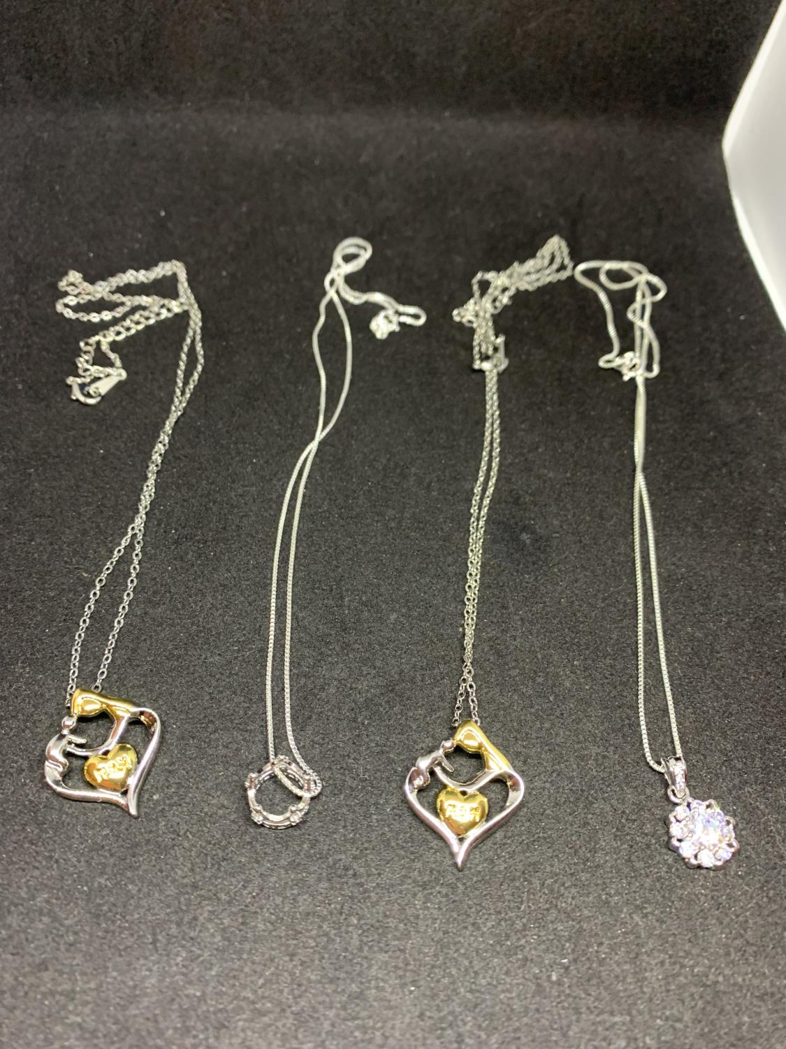 FOUR SILVER NECKLACES WITH PENDANTS TO INCLUDE HEARTS, CROWN AND FLOWER - Image 2 of 6