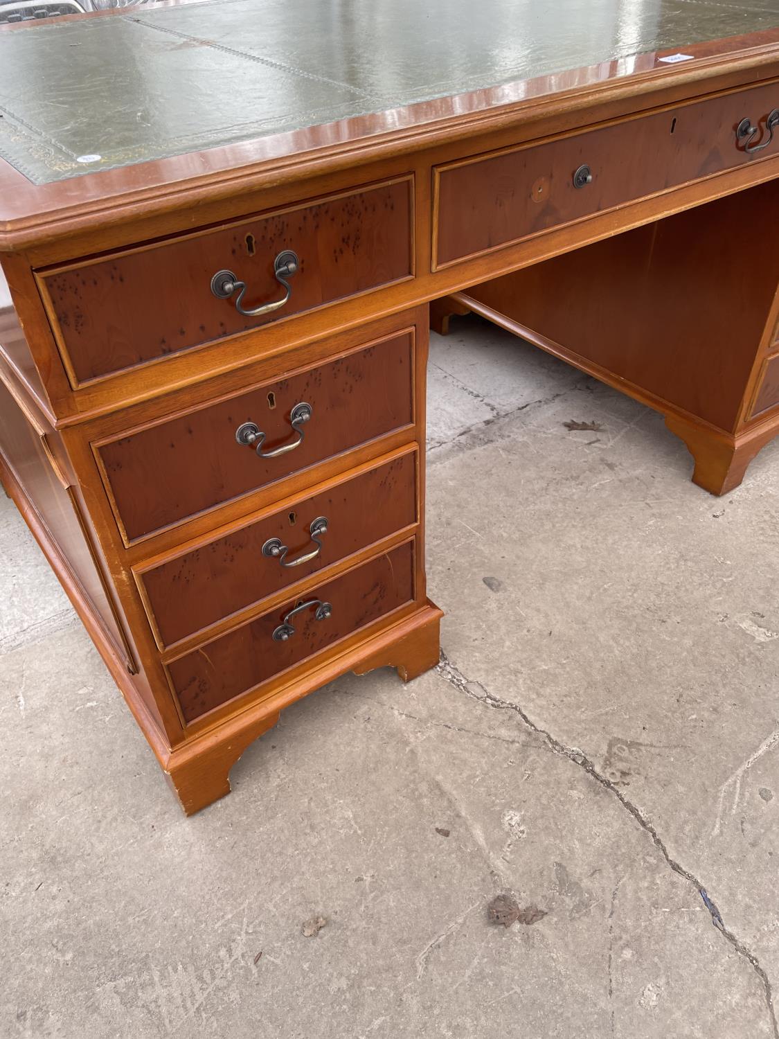 A REPRODUCTION YEW WOOD TWIN PEDESTAL DESK ENCLOSING NINE DRAWERS WITH INSET LEATHER TOP 60" X 36" - Image 3 of 4