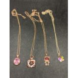 FOUR SILVER NECKLACES MARKED 925 WITH PENDANTS TO INCLUDE A TEDDY, FLOWER ETC WITH COLOURED STONES