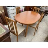 A MORRIS OF GLASGOW DINING TABLE AND FOUR CHAIRS