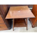 AN EDWARDIAN MAHOGANY 22.5" SQUARE OCCASIONAL TABLE ON SPLAY LEGS WITH GALLERIED UNDER-TIER