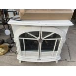 A DECORATIVE ELECTRIC FIRE MADE TO LOOK LIKE A LOG BURNER BELIEVED IN WORKING ORDER BUT NO WARRANTY
