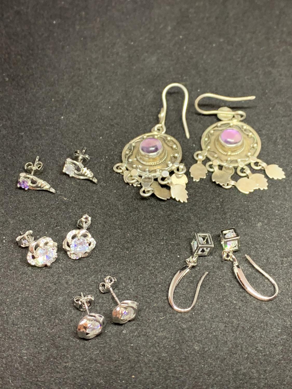 FIVE PAIRS OF SILVER EARRINGS TO INCLUDE DROP, FLOWER ETC WITH CLEAR STONES