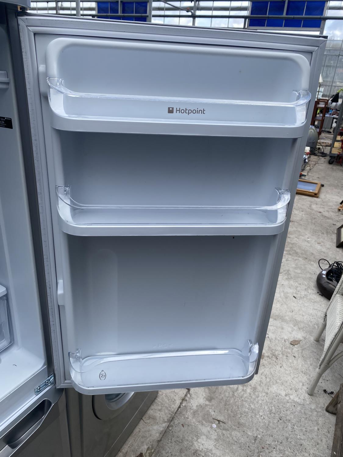 A SILVER HOTPOINT FRIDGE FREEZER BELIEVED IN WORKING ORDER BUT NO WARRANTY - Image 4 of 5