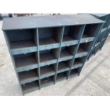 A VINTAGE 16 SECTION PIGEON HOLE STORAGE UNIT