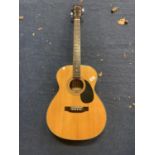 AN ENCORE ACOUSTIC GUITAR