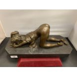 AN ORIGINAL BRONZE IN THE FORM OF A SEMI NUDE FEMALE (LENGTH OF PLINTH 36CM)