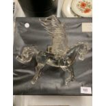 A CRYSTAL GLASS SCULPTURE OF A WINGED HORSE