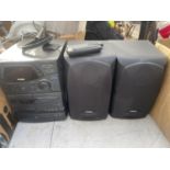 A PHILIPS STEREO SYSTEM WITH TWO SPEAKERS BELIEVED IN WORKING ORDER BUT NO WARRANTY