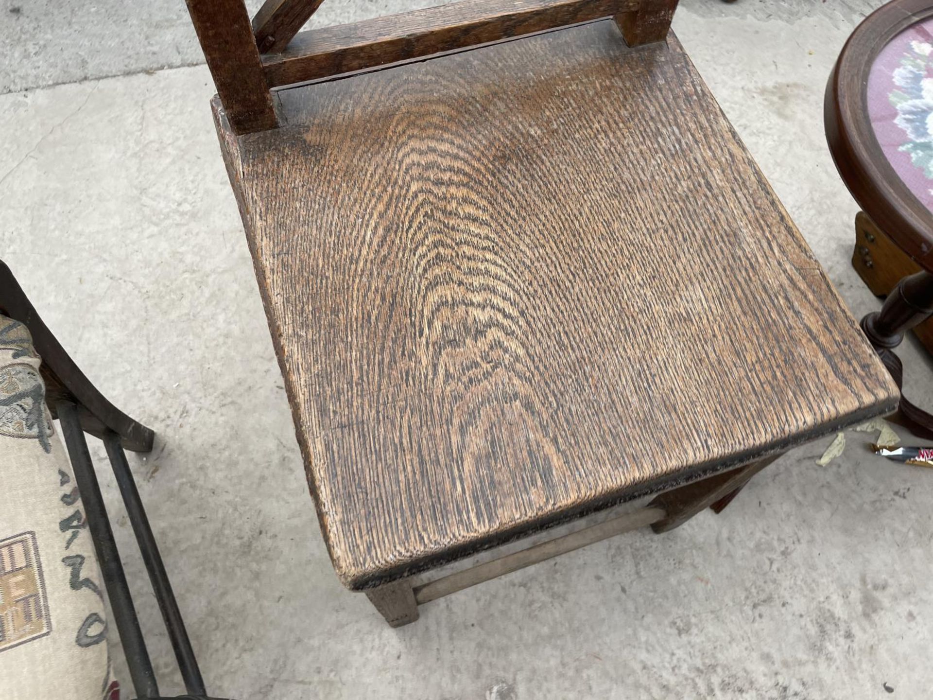 A VICTORIAN OAK KITCHEN CHAIR WITH SOLID SEAT AND X FRAME BACK - Image 2 of 3