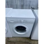 A WHITE CURRYS ESSENTIAL WASHING MACHINE BELIEVED IN WORKING OIRDER BUT NO WARRANTY