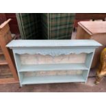 A PAINTED THREE TIER WALL SHELF, 38.5" WIDE
