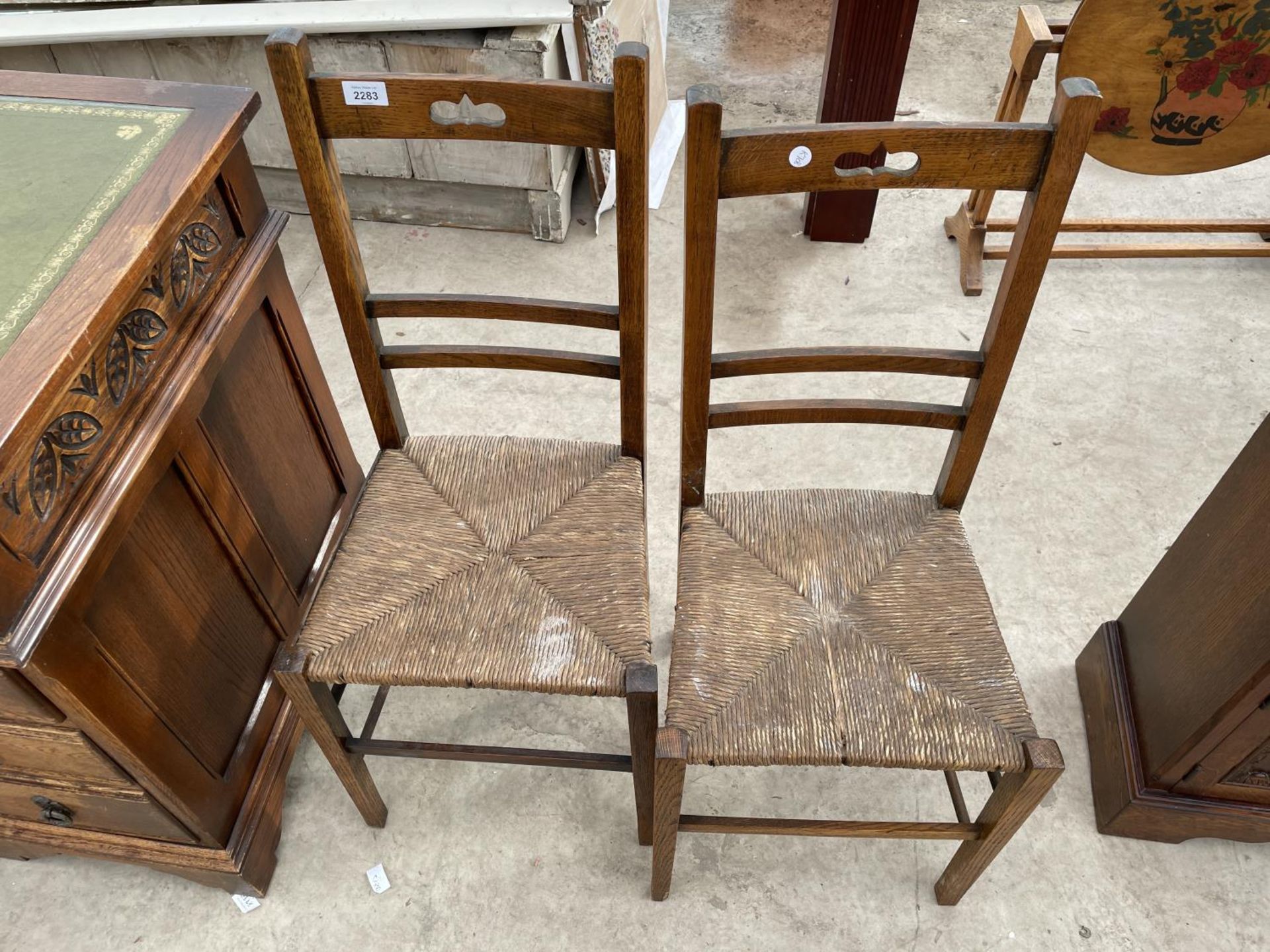 A PAIR OF RUSH SEATED BEDROOM CHAIRS