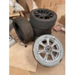FOUR RIMS AND FIVE TYRES THIS ITEMS TO BE COLLECTED FROM THE WAREHOUSE AT BOSLEY CROSSROADS SK110PS