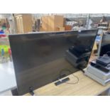 A BUSH 49" TELEVISION WITH REMOTE CONTROL BELIEVED IN WORKING ORDER BUT NO WARRANTY