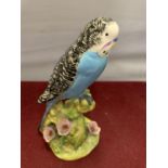 A BESWICK BUDGIE WITH FLOWERS NO 1217