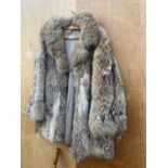 A VALERIE AGGOTT LADIES FUAX FUR COAT