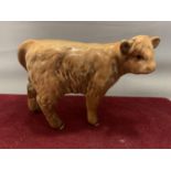 A BESWICK HIGHLAND CALF