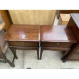 A PAIR OF STAG MINSTREL BEDSIDE TABLES