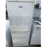 A WHITE FRIGIDAIRE UPRIGHT FRIDGE FREEZER BELIEVED WORKING BUT NO WARRANTY