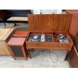 A MAHOGANY AND CROSSBANDED STEREO UNIT COMPLETE WITH TWO SPEAKERS, DYNATRON RADIO AND GOLDRING