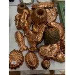 A LARGE COLLECTION OF VARIOUS COPPER MOULDS