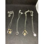 FOUR SILVER NECKLACES WITH PENDANTS TO INCLUDE HEARTS, CROWN AND FLOWER