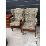 A PAIR OF LEWIS FURNITURE 'LICHFIELD' WINGED ORTHOPAEDIC CHAIRS