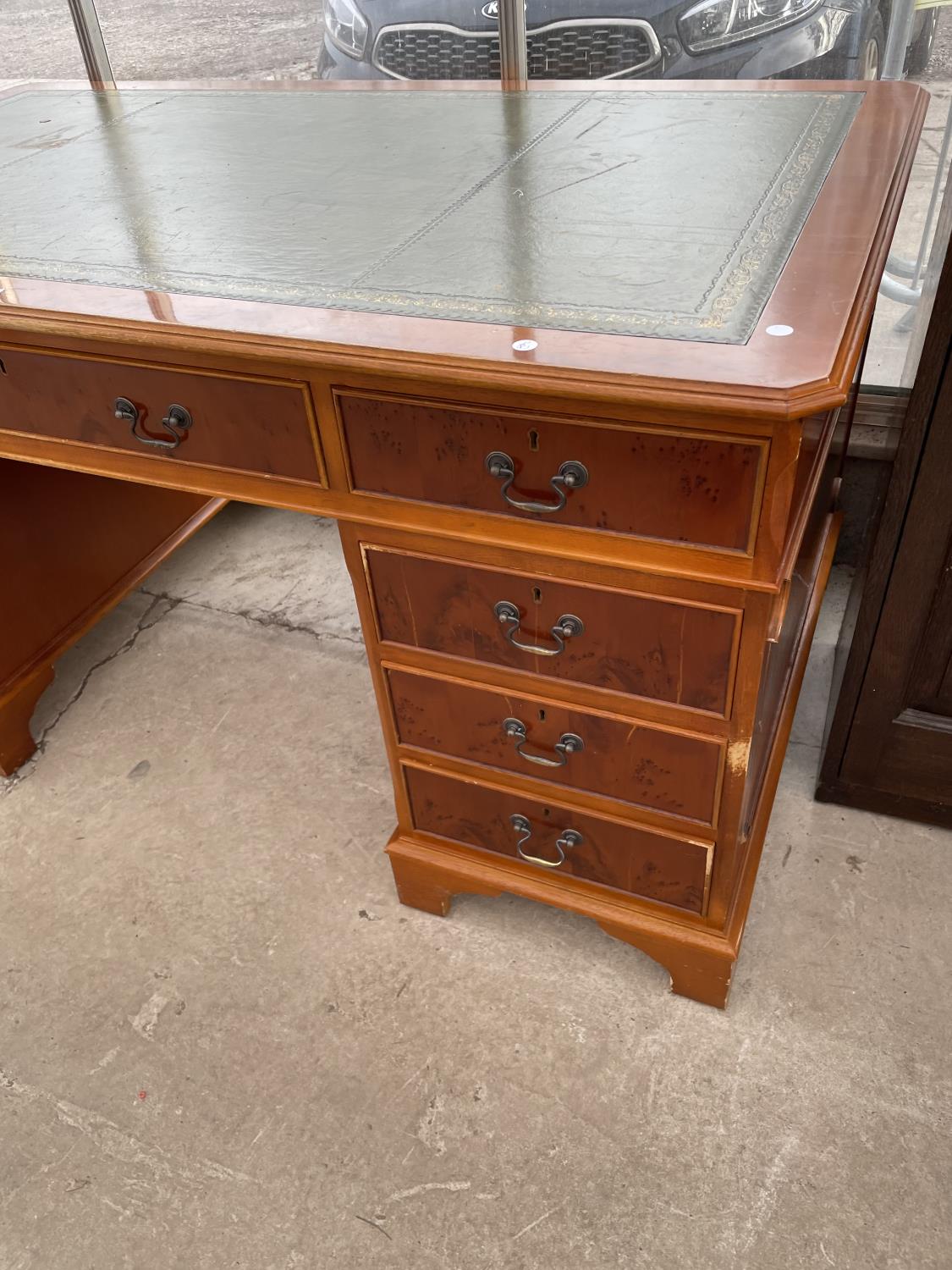 A REPRODUCTION YEW WOOD TWIN PEDESTAL DESK ENCLOSING NINE DRAWERS WITH INSET LEATHER TOP 60" X 36" - Image 4 of 4
