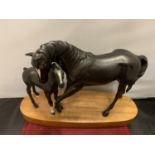 A BESWICK BLACK BEAUTY WITH FOAL