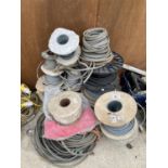 A LARGE QUANTITY OF WIRE CABLING ON REELS
