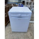 A WHITE HOTPOINT DISH WASHER BELIEVED IN WORKING ORDER BUT NO WARRANTY