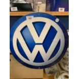 A ROUND VW SIGN
