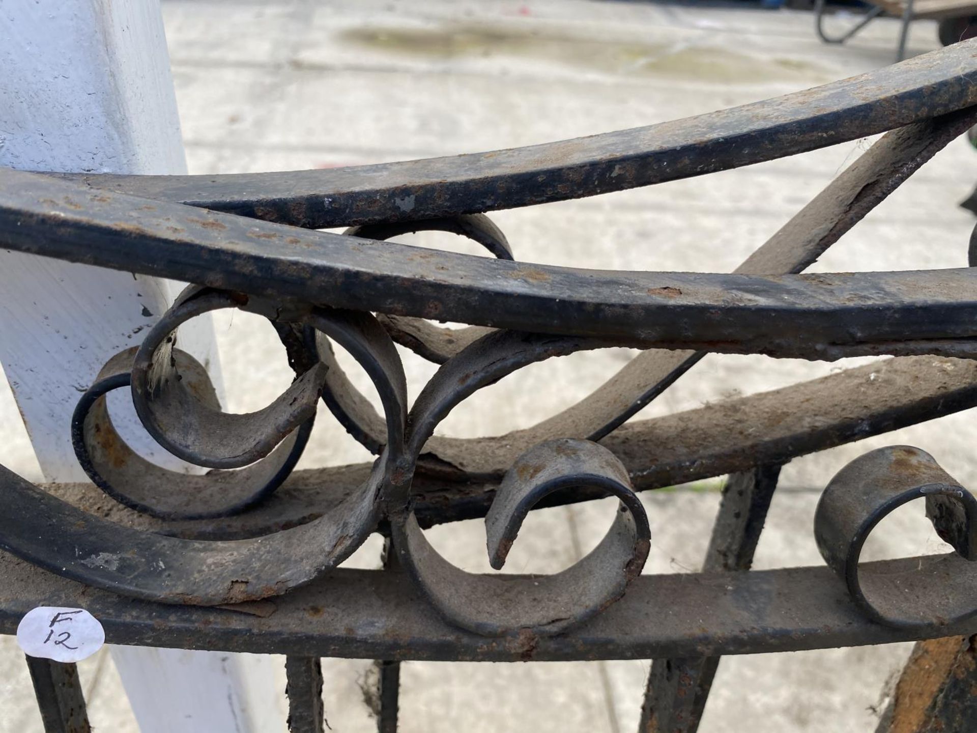 A PAIR OF DECORATIVE WROUGHT IRON GATES - Image 3 of 3