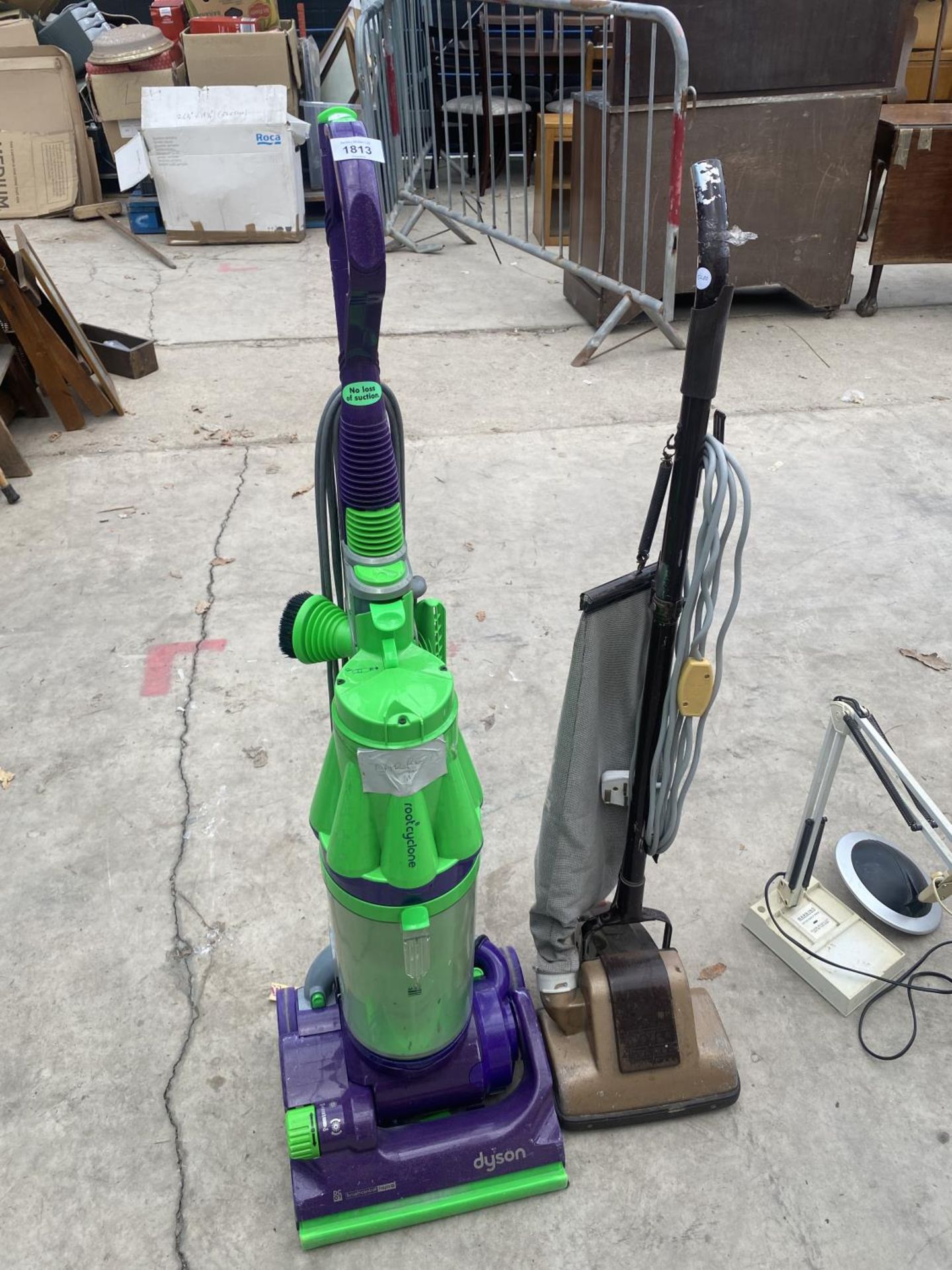 A DYSON DC07 VACCUUM AND A FURTHER RETRO HOOVER